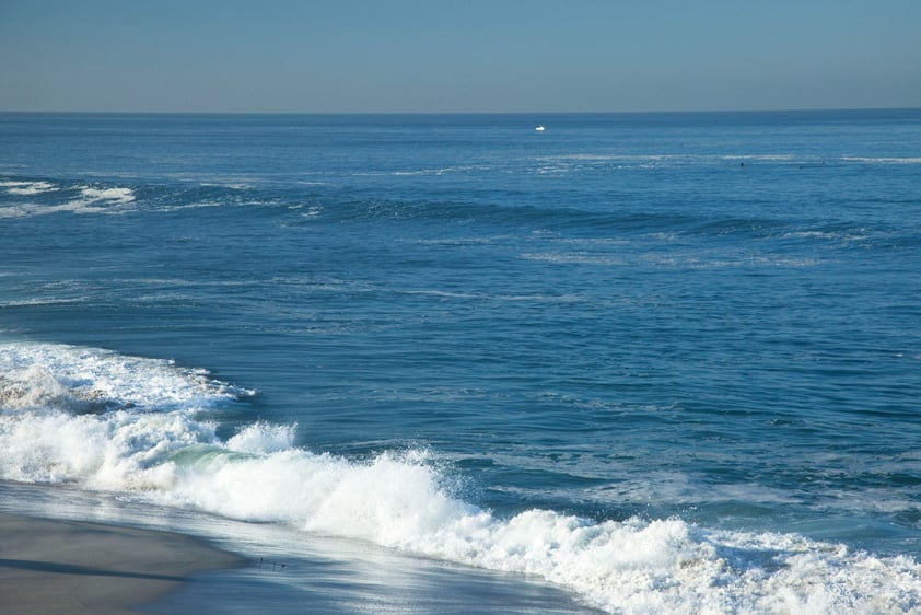 Waves hitting the beach