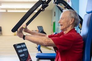 Senior man working out at gym