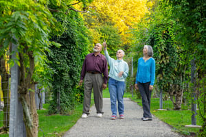 Three seniors walking around Arboretum