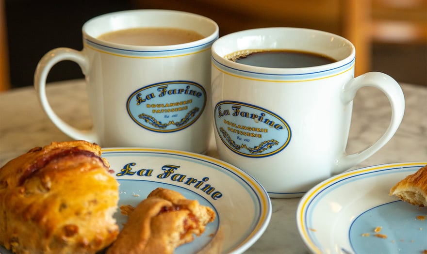 Coffee mugs and pastries