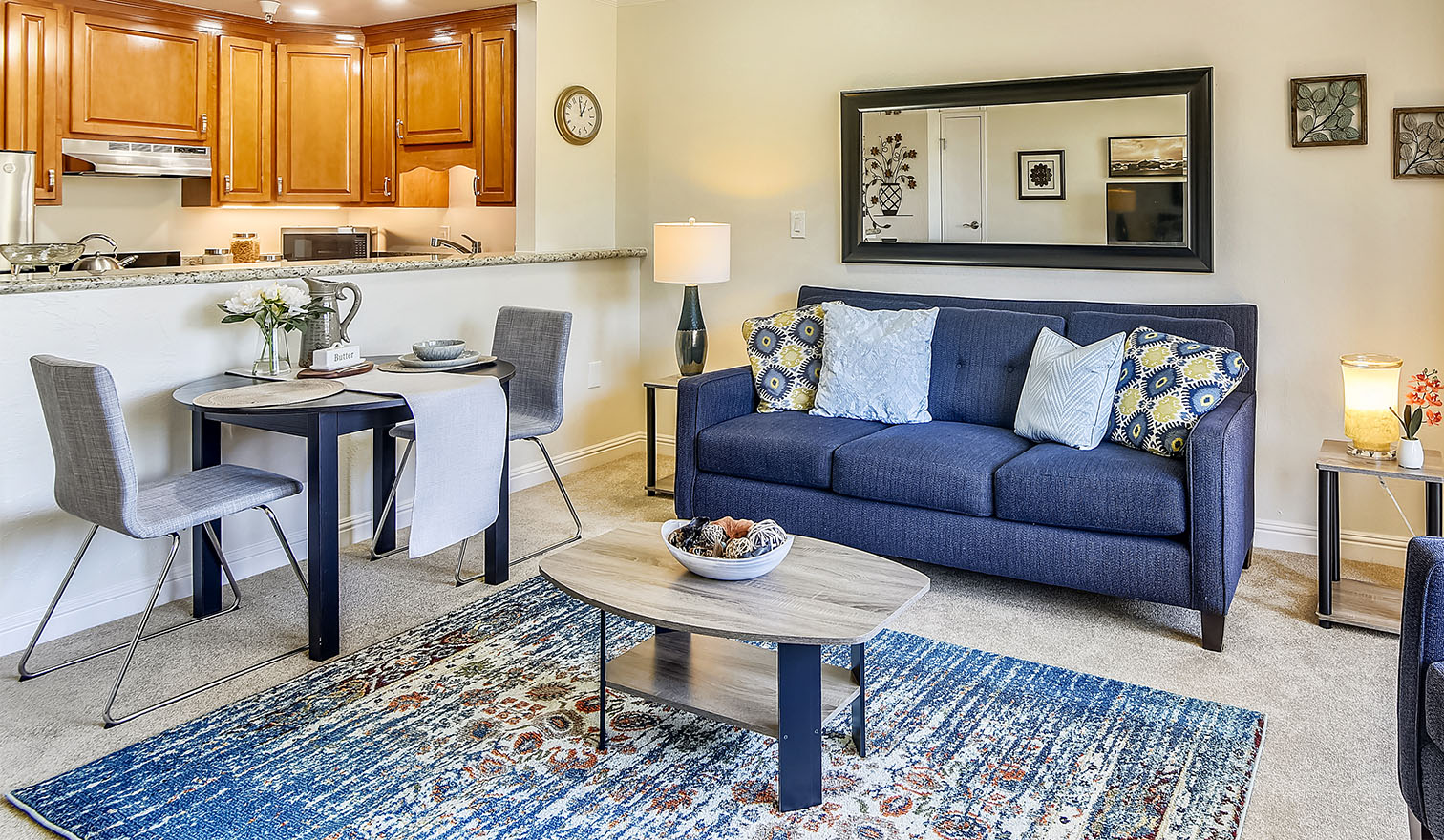 Living room and kitchen of an apartment at Piedmont Gardens