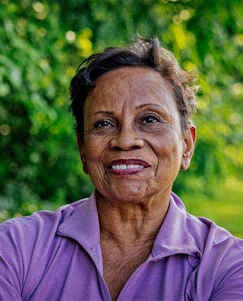 Smiling senior woman outside