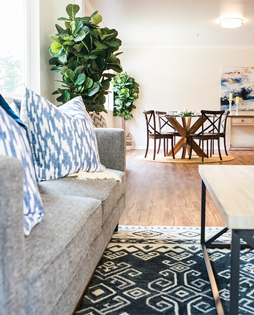 View of dining room from the living room of a home at Redwood Terrace