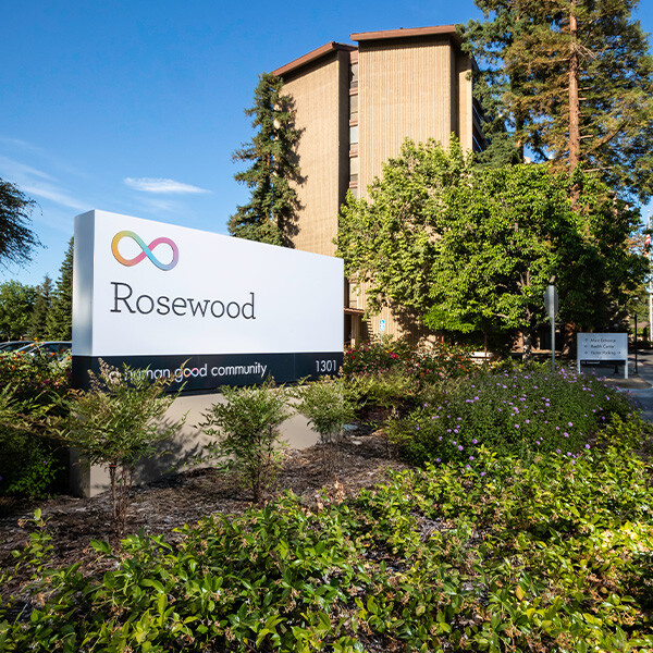 Sign outside Rosewood, a HumanGood Life Plan Community in Bakersfield, California