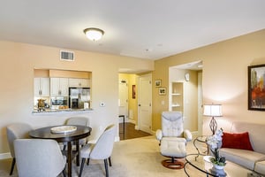 Living room with a view of the kitchen of an apartment at The Terraces at Los Altos