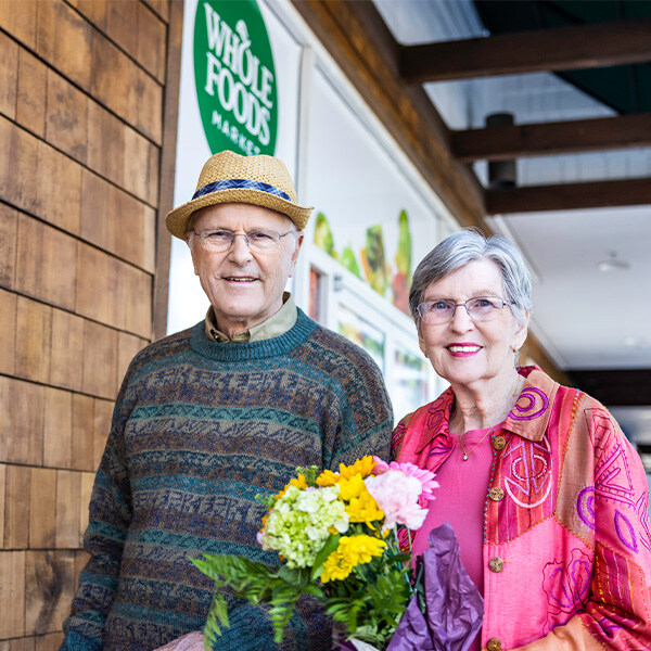 Senior couple leaving a Whole Foods Market