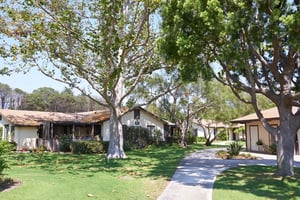 Walking path between homes on the campus of Valle Verde