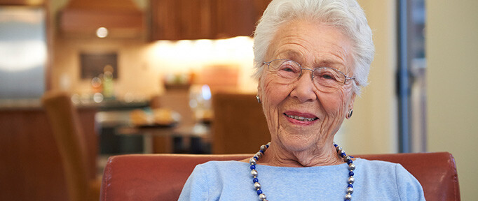 Senior woman wearing glasses smiling