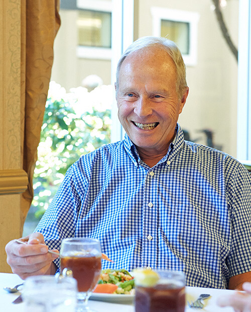 Senior man eating lunch