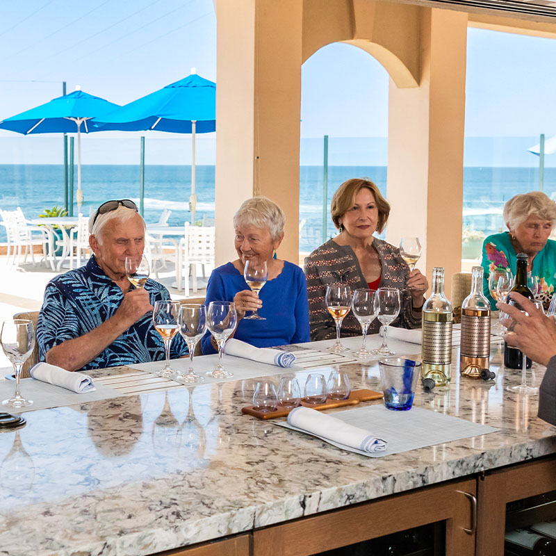 Seniors at a wine tasting event