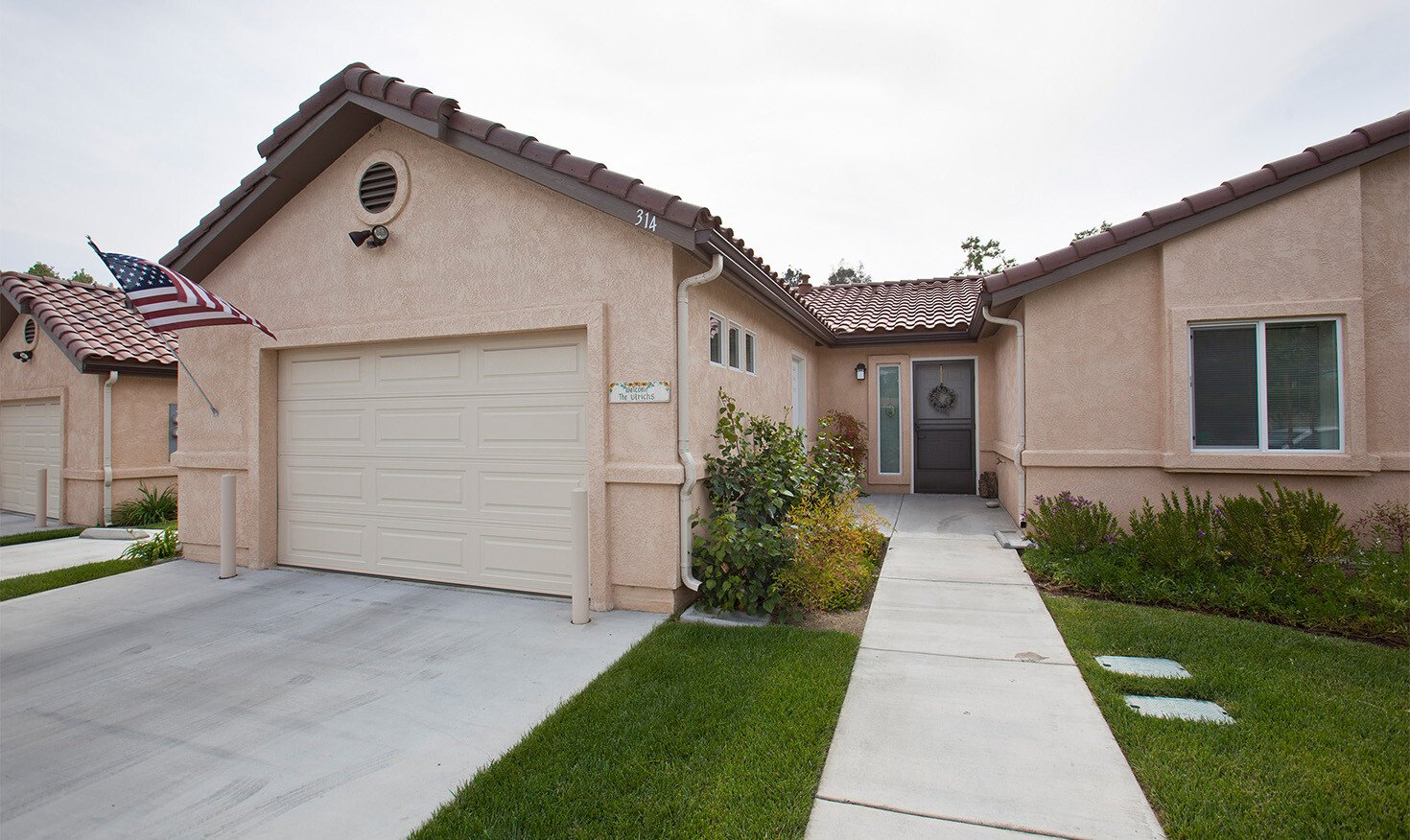 Exterior of a home with garage at Westminster Gardens