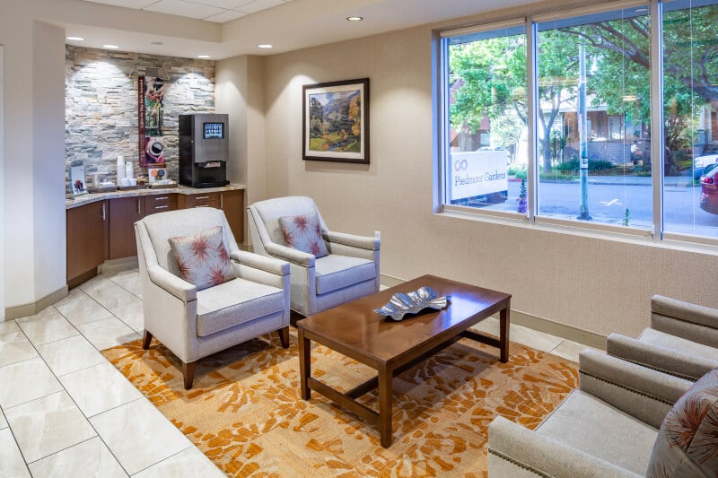 Lobby at Piedmont Gardens with seating area and coffee bar