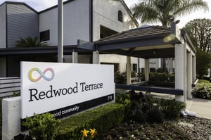 Redwood Terrace sign outside the entrance to the community