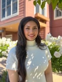 Headshot of Preet Kaur, executive director