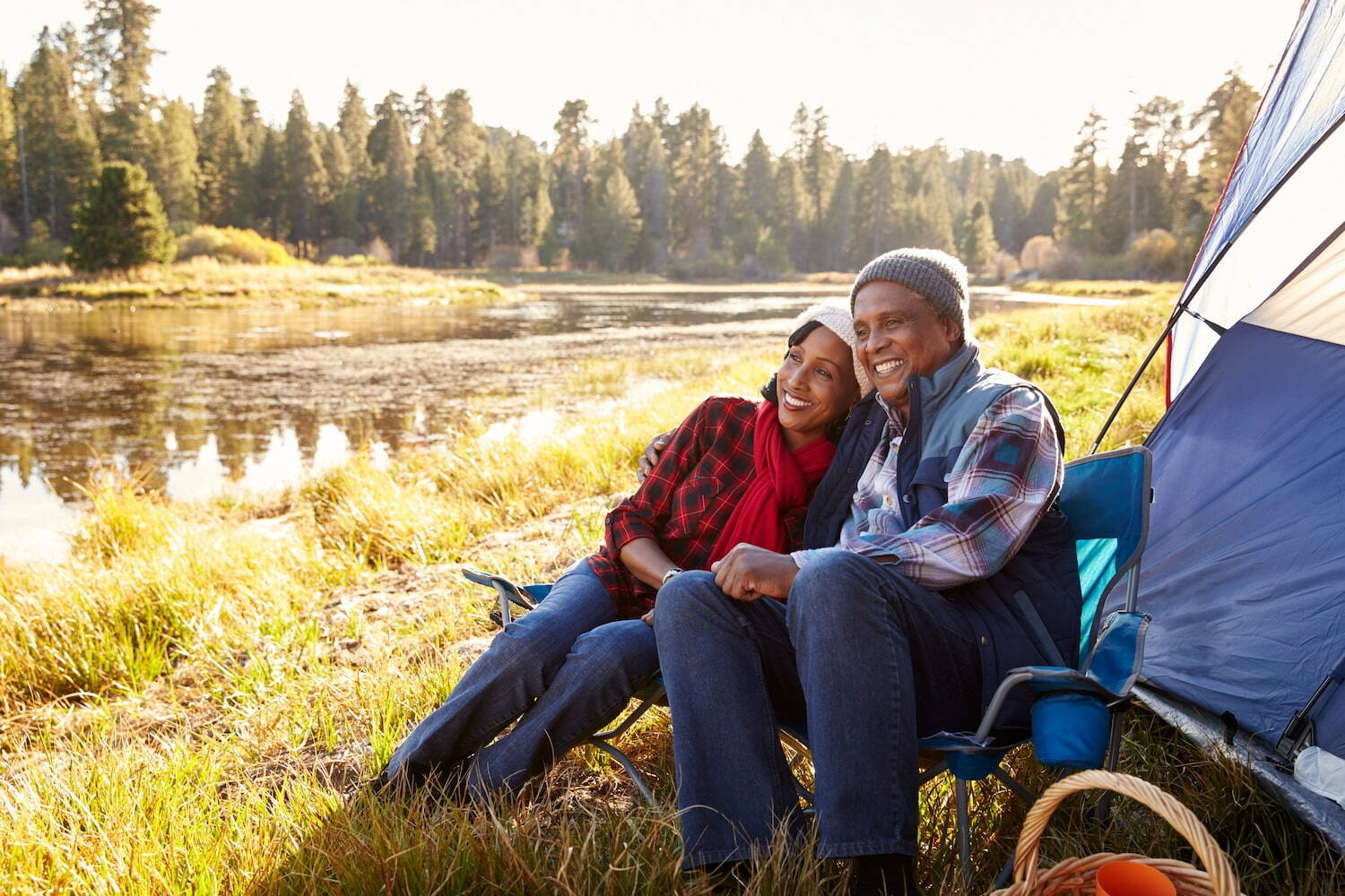 Senior couple on autumn camping trip