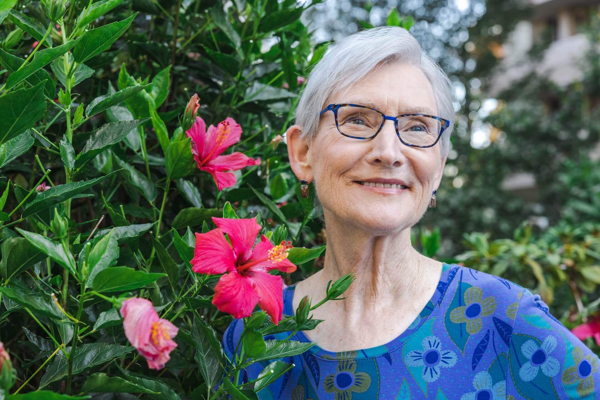 Lois smiling in the garden