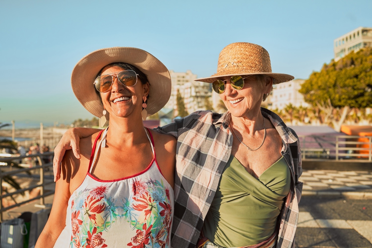 smiling senior women dressed for a beach destination retirement